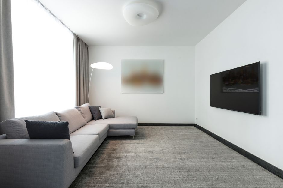 Beautifully clean living room carpet with modern furniture